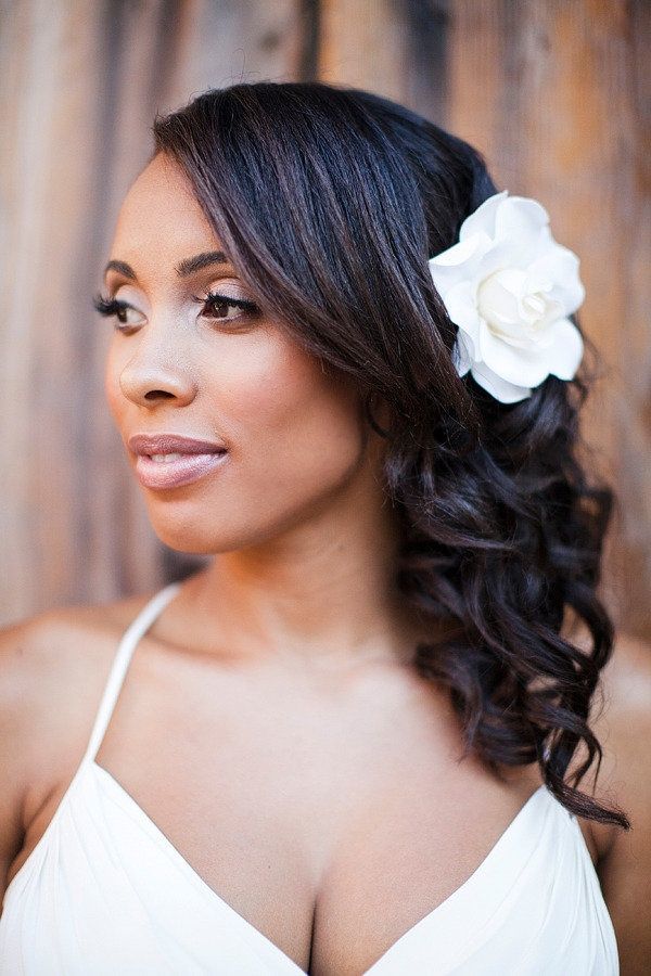 Black bridal hairstyle with flower
