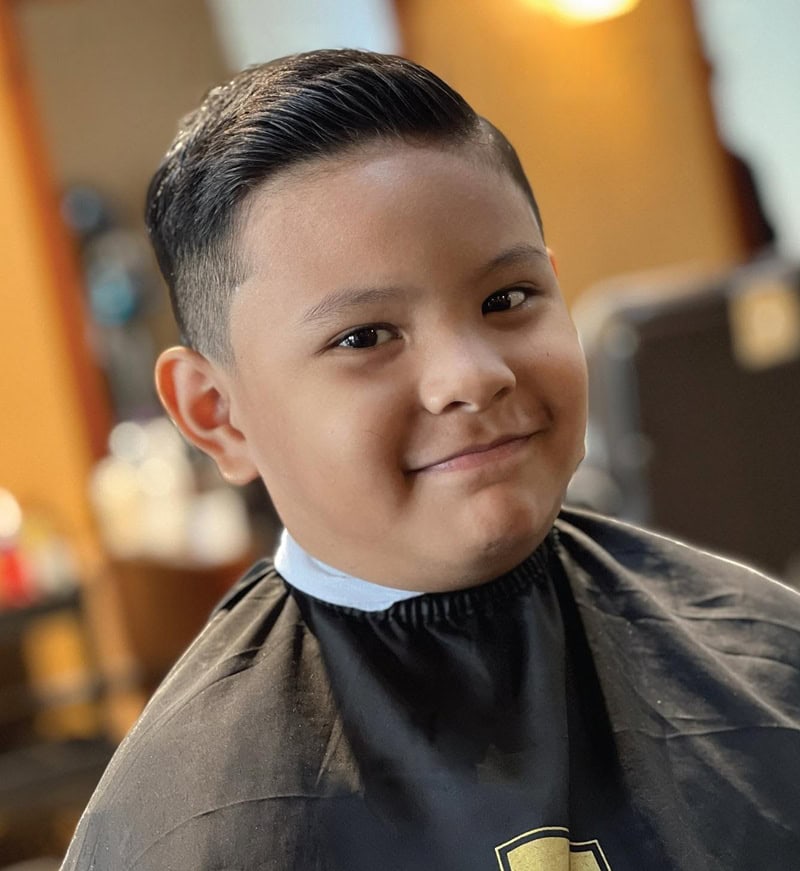 10 year old boy side swept hairstyle with faded sides