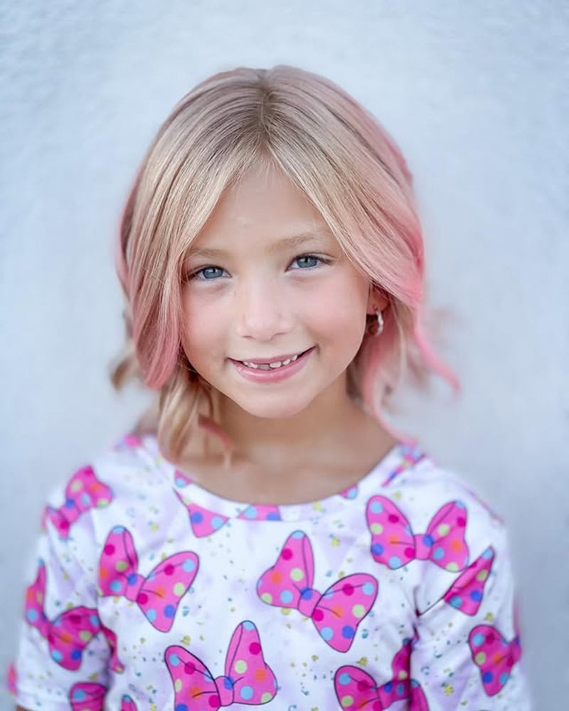10 year old girl blonde bob with pastel pink peek-a-boo highlights