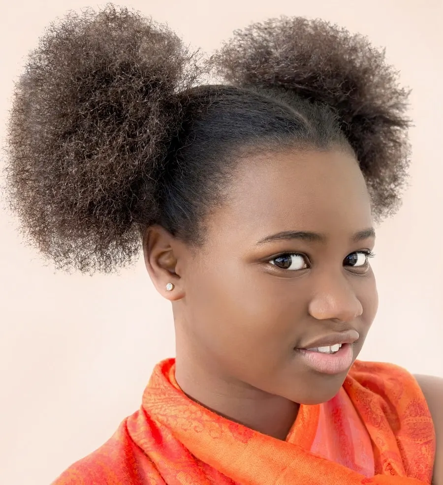 11 year old black girl with afro puff hairstyle