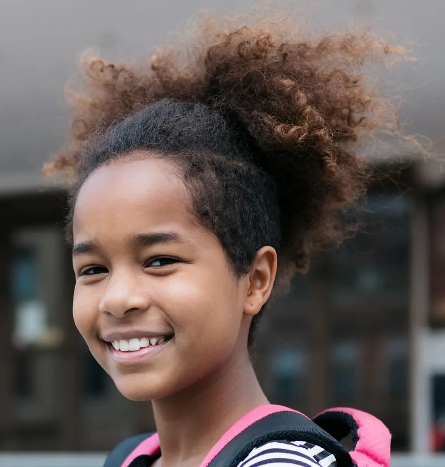 11 year old black girl with curly hairstyle