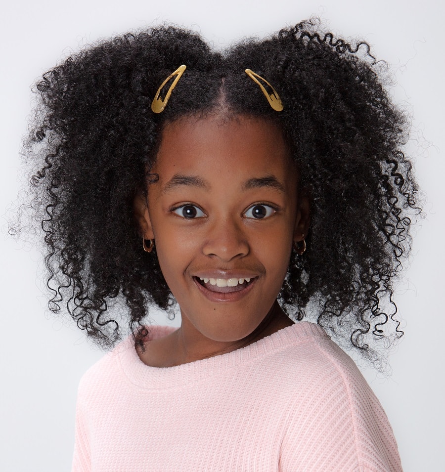 11 year old black girl with middle part hairstyle