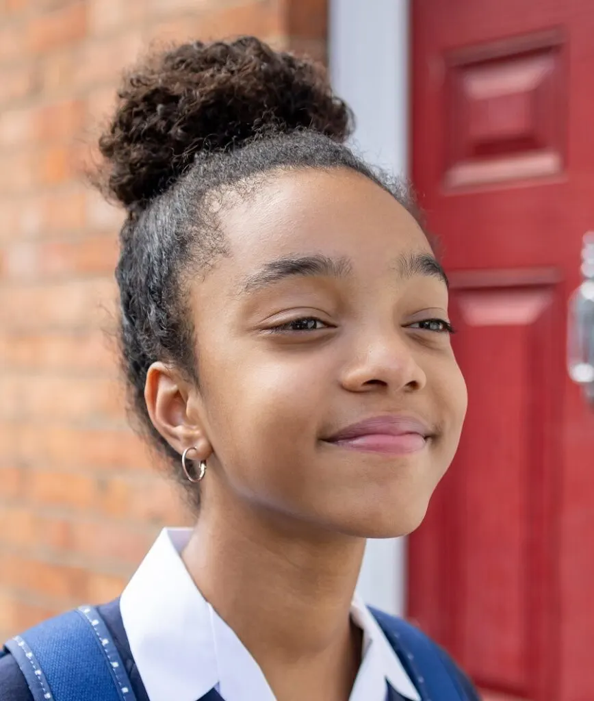 11 year old black girl with updo hairstyle