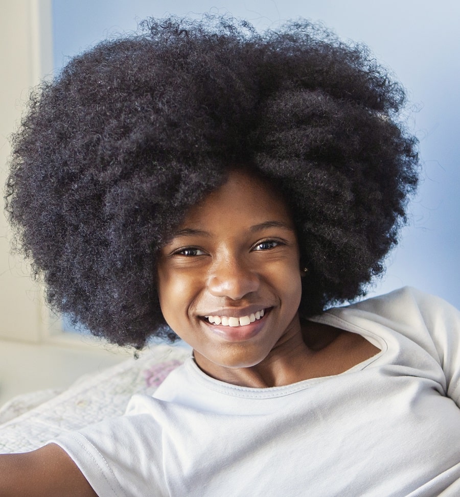13 year old black girl with medium afro hair