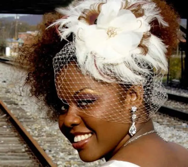 Updo with Feathers and Lace Veil