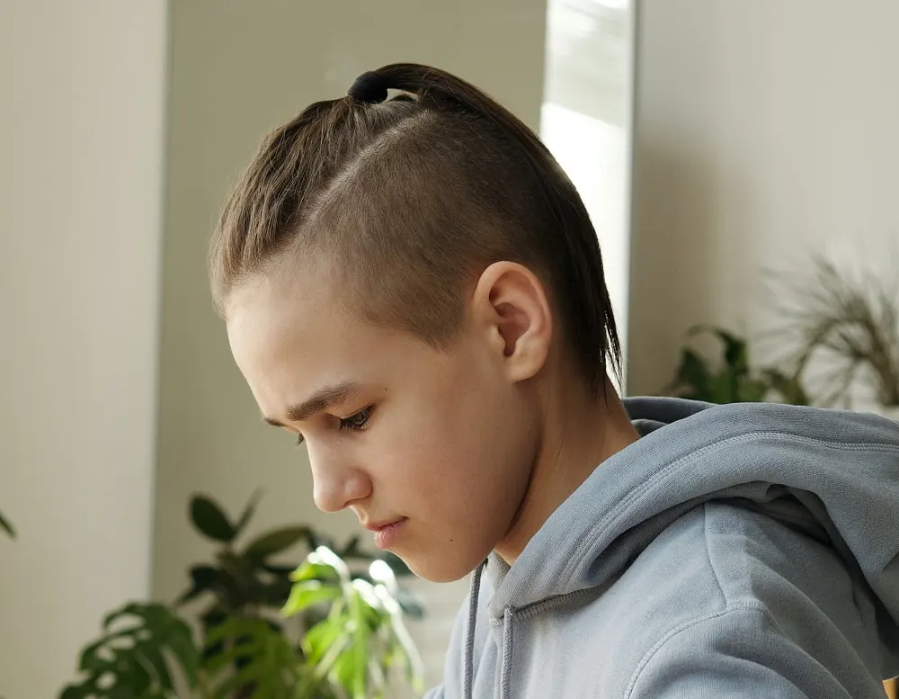 14 year old boy with ponytail