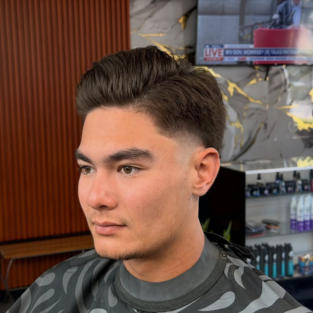voluminous 1950s greaser comb over