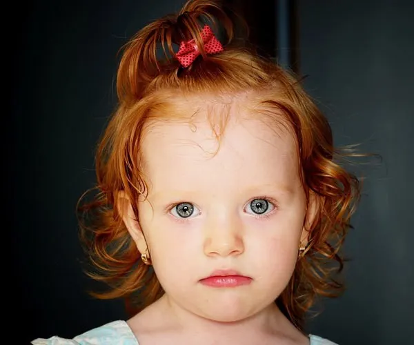 Red bow little girl haircut