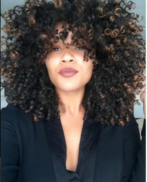 Serious Afro natural blonde hairstyle for girl