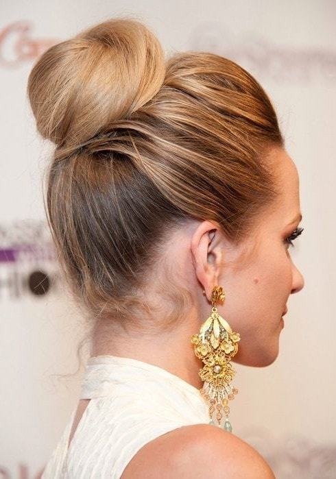 classic bun hairstyle with medium length hair