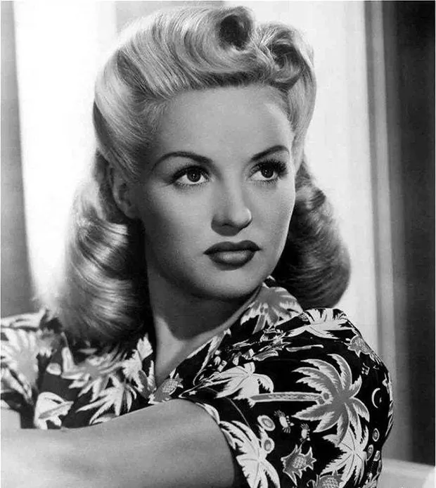 Large rolls Victory Rolls hairstyles for young girl