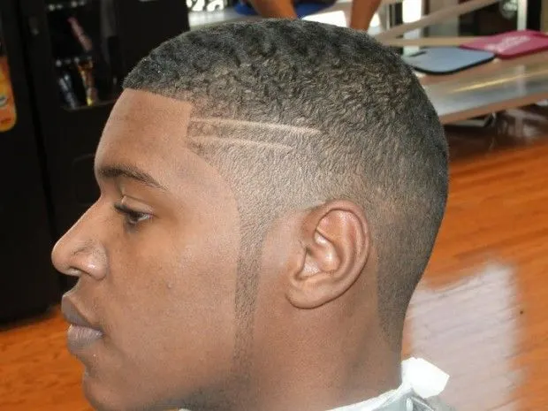 black haircut with 3 lines on side