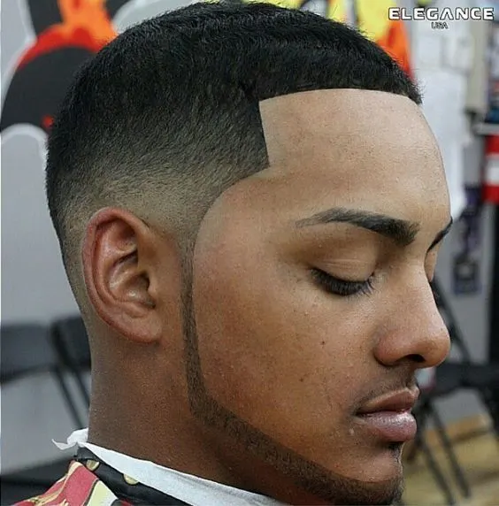 Geometrical fade hairstyle for black boy