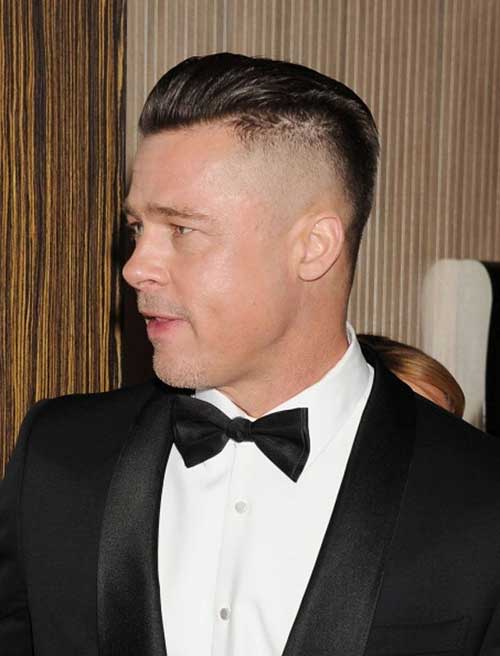 Taper fade comb hairstyle for men 