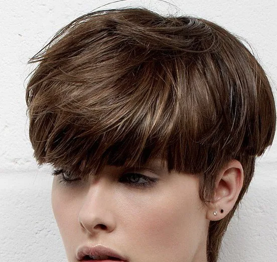 Asymmetrical cap hairstyle for young girl