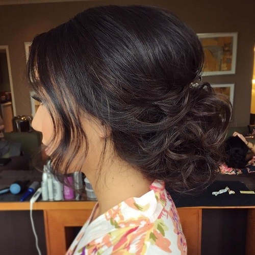 curly bun hairstyle for women