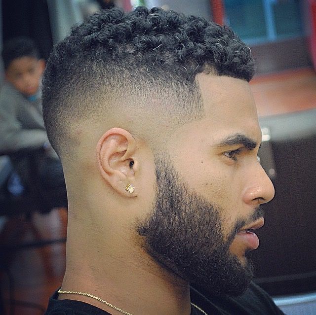 tight curly fade blowout hairstyle