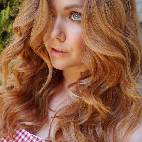Curl with Strawberry Blonde Hair Color idea