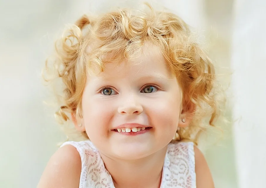 3 year old girl with short curly hair