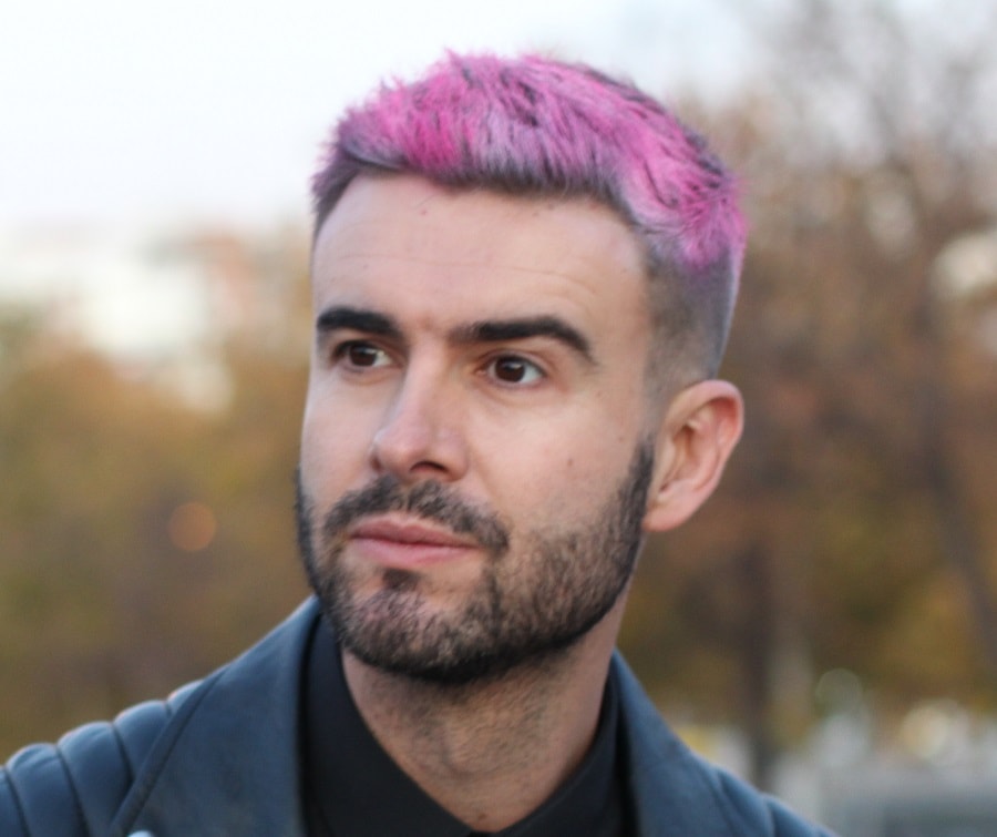 30 year old man with short pink hair