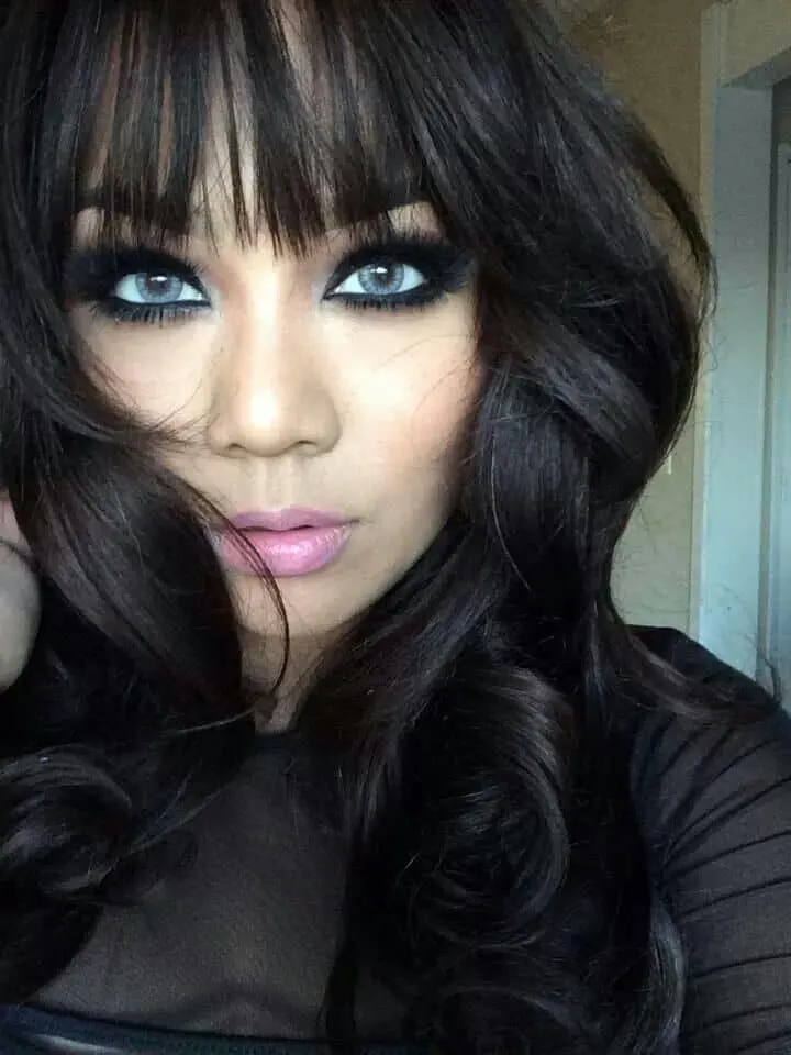 Black Bang hairstyle with Blue Eyes 