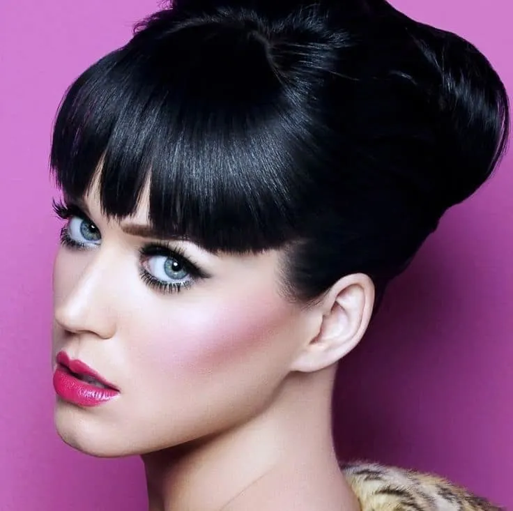 womens Black Bang hairstyle with Blue Eyes 