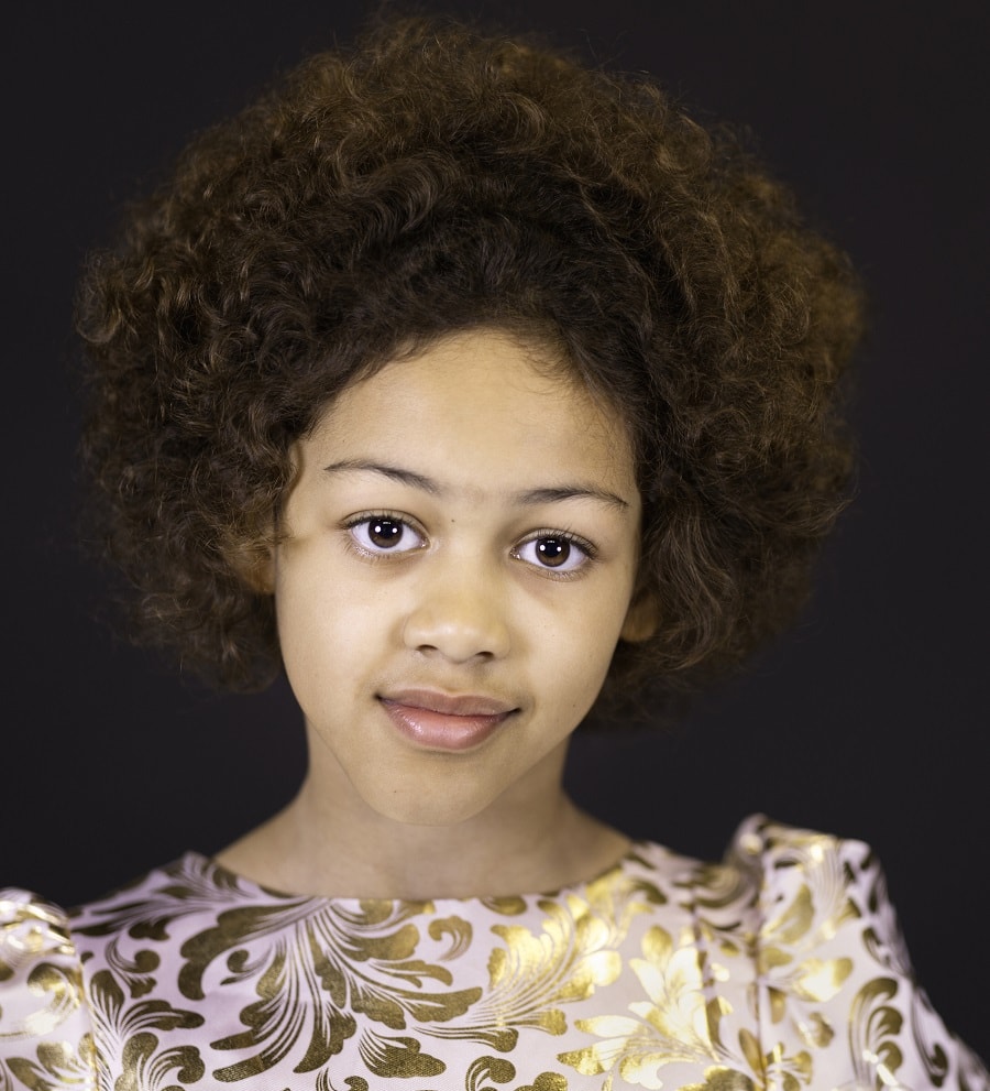 8 year old black girl with brown afro hair