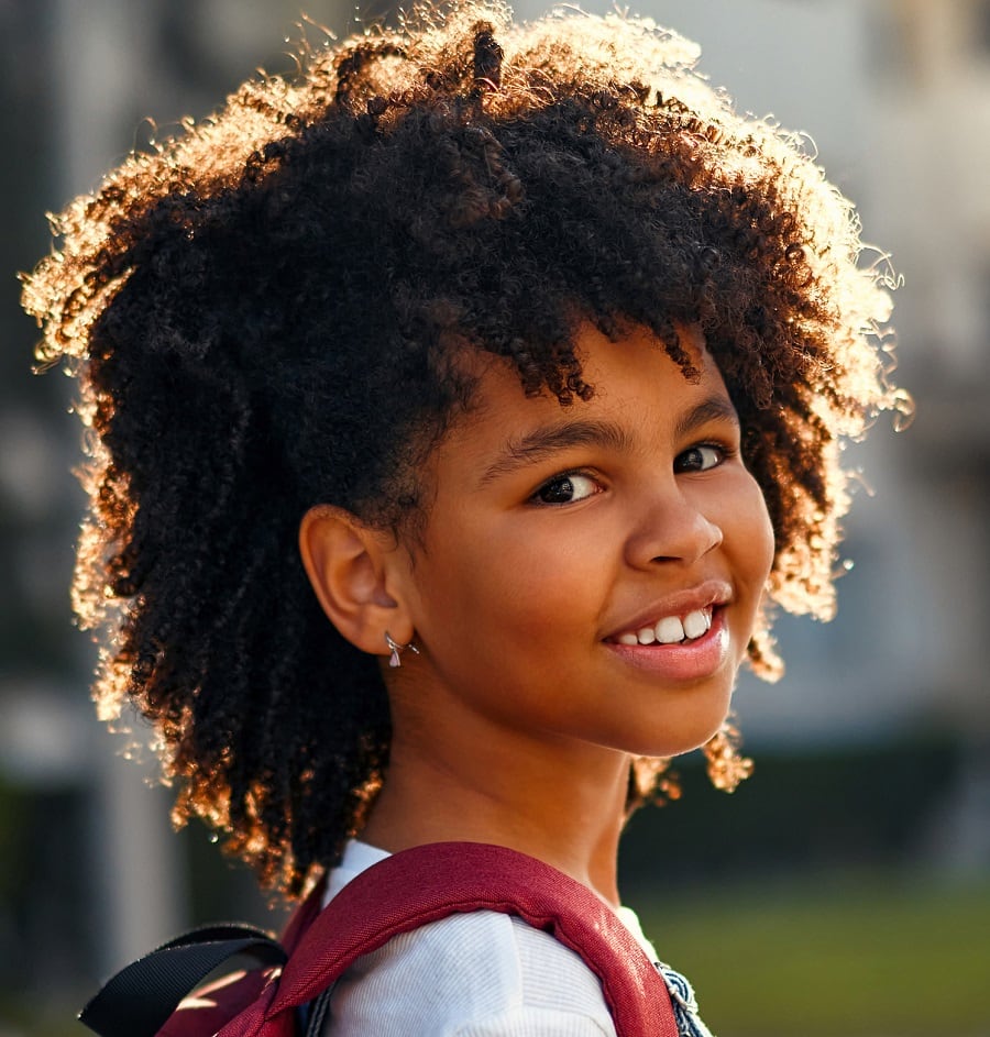 8 year old black girl with curly bangs
