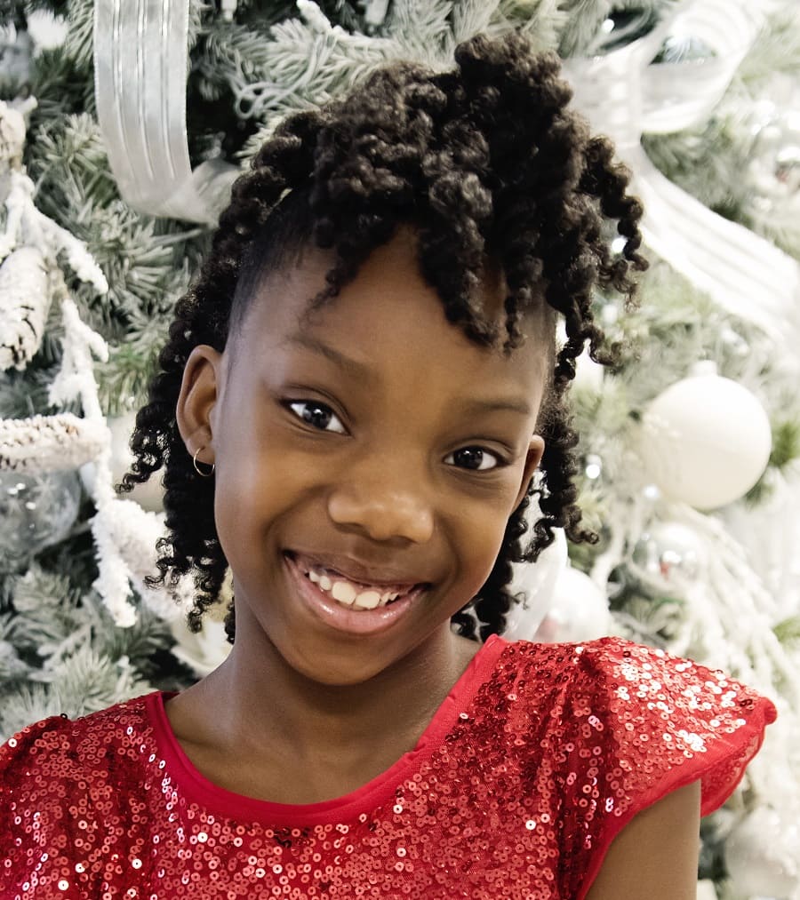 8 year old black girl with short curly hairstyle