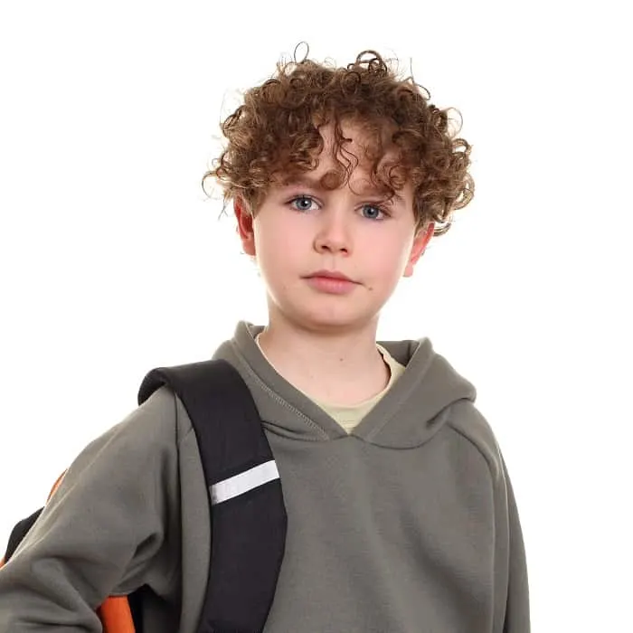 9 year old boy with curly hair