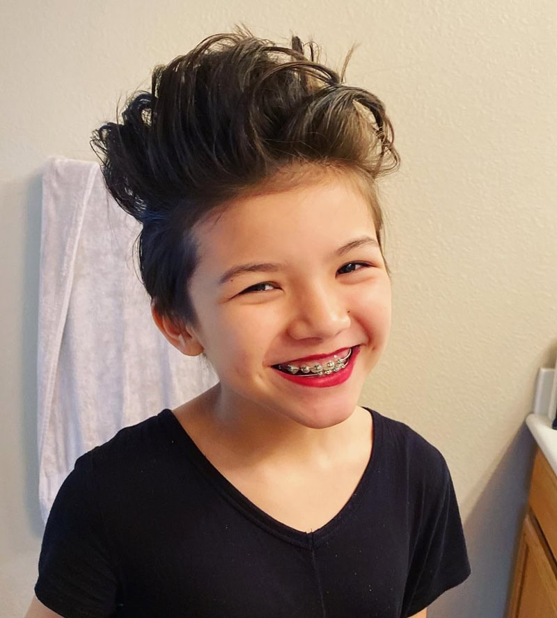 9 year old girl with a voluminous textured pixie cut
