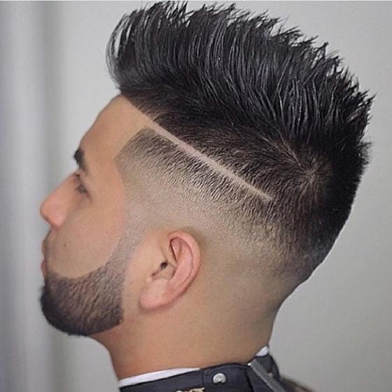 90's men's hairstyle with tram lines