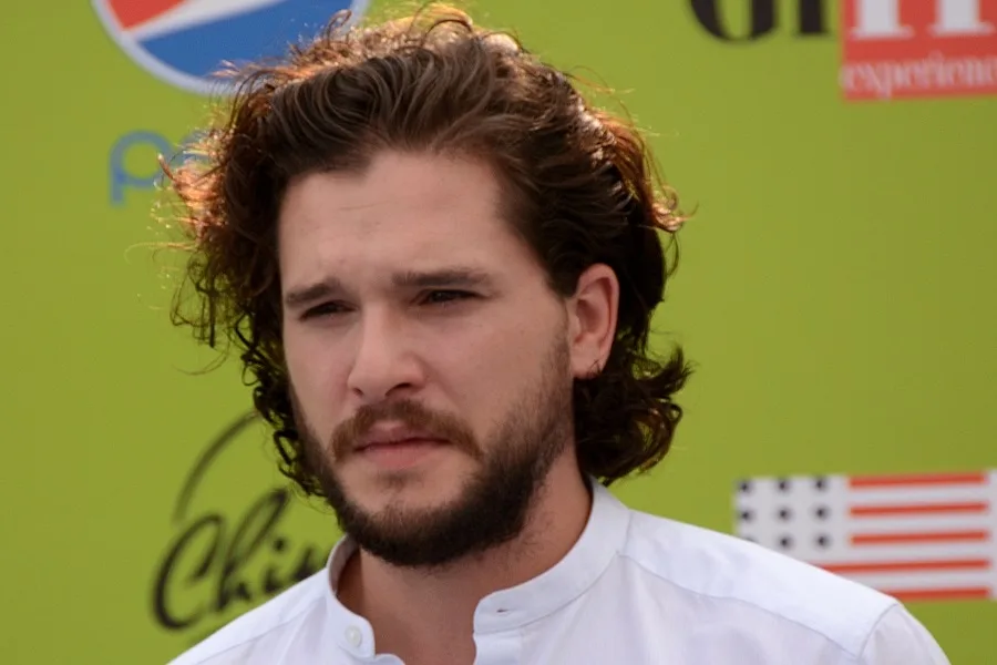 Actor Kit Harington with Medium Curly Hair