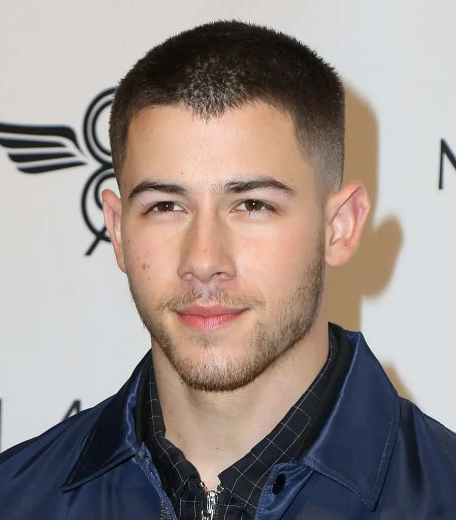 Actor Nick Jonas With Buzz Cut