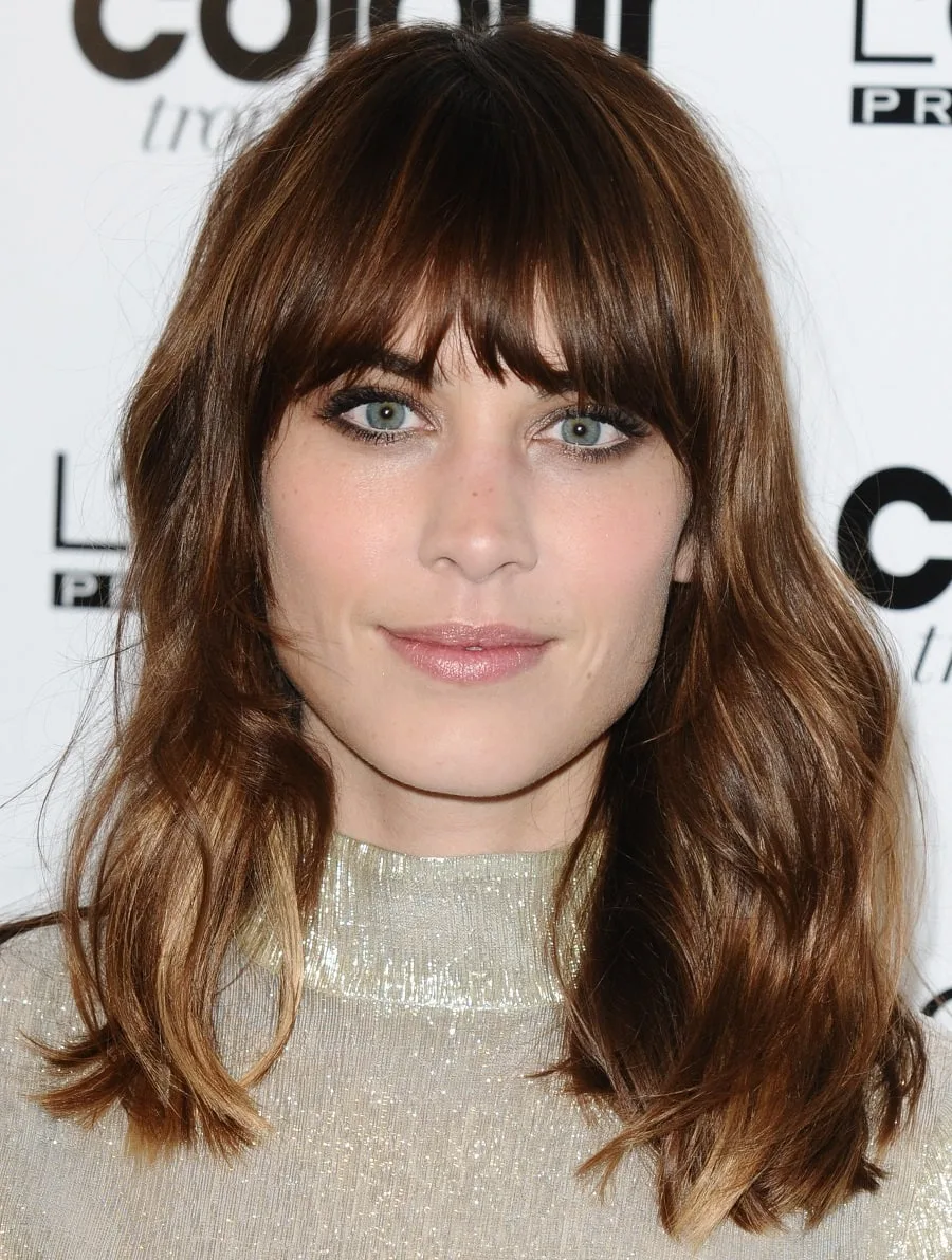 Actress Alexa Chung with brown hair and green eyes