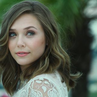 Actress Elizabeth Olsen with Brown Hair and Green Eyes