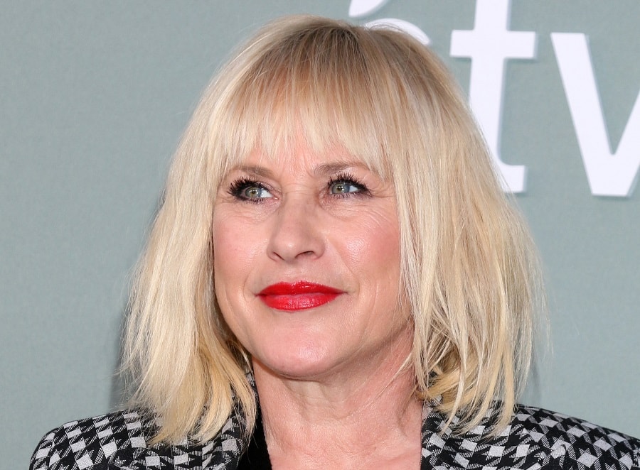 Actress Patricia Arquette Over 50 With Blonde Bangs Hairstyle
