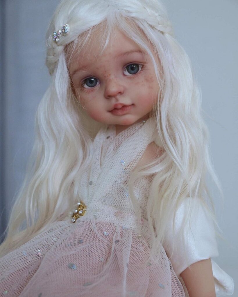 American girl doll with long blonde hair