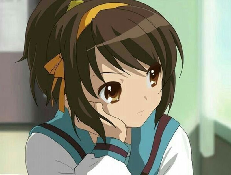Anime character Haruhi Suzumiya featuring a medium-length brown ponytail secured with a yellow ribbon, styled with straight face-framing bangs.