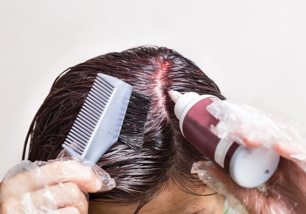 Apply a liquid-based toner to dry hair - cut method