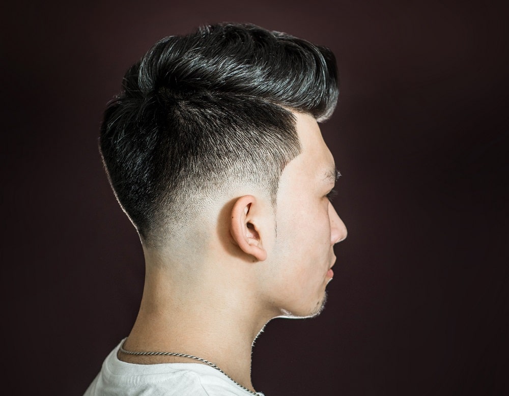 Asian boy with low drop fade