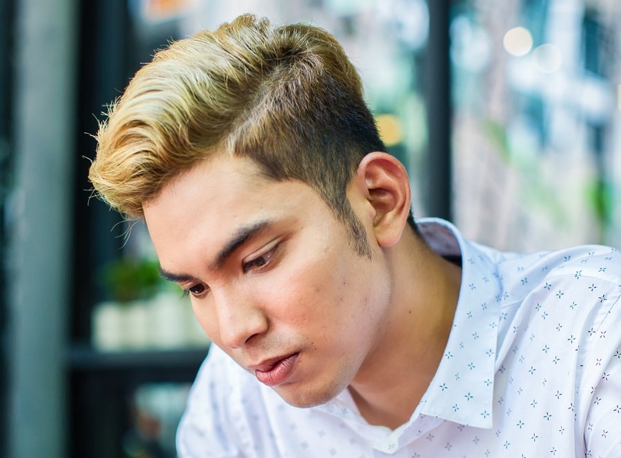 Asian guy with short dark hair and blonde highlights