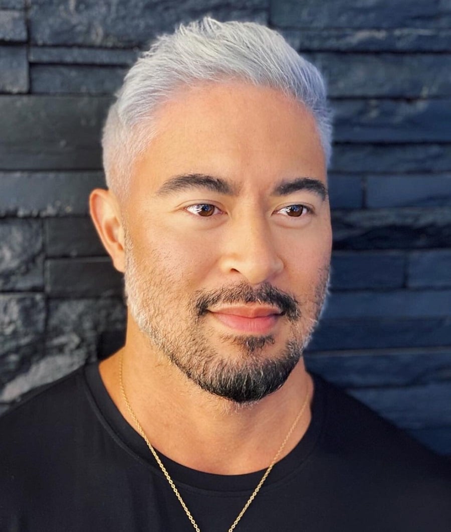 Asian guy with short silver hair