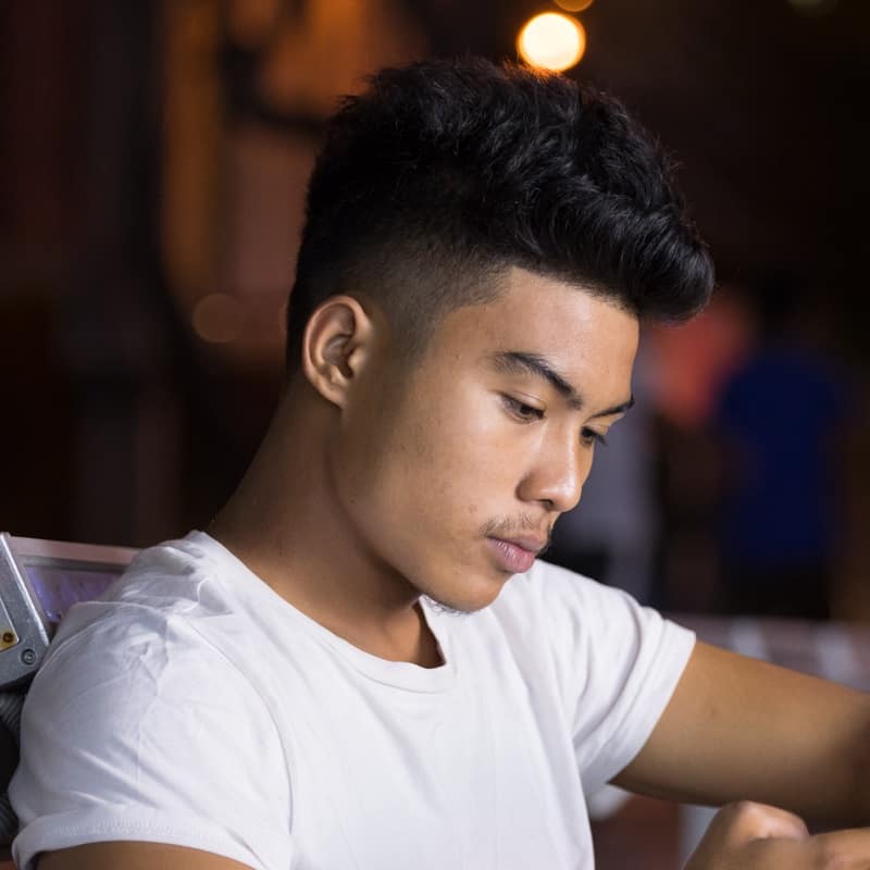 asian guy with short thick hairstyle
