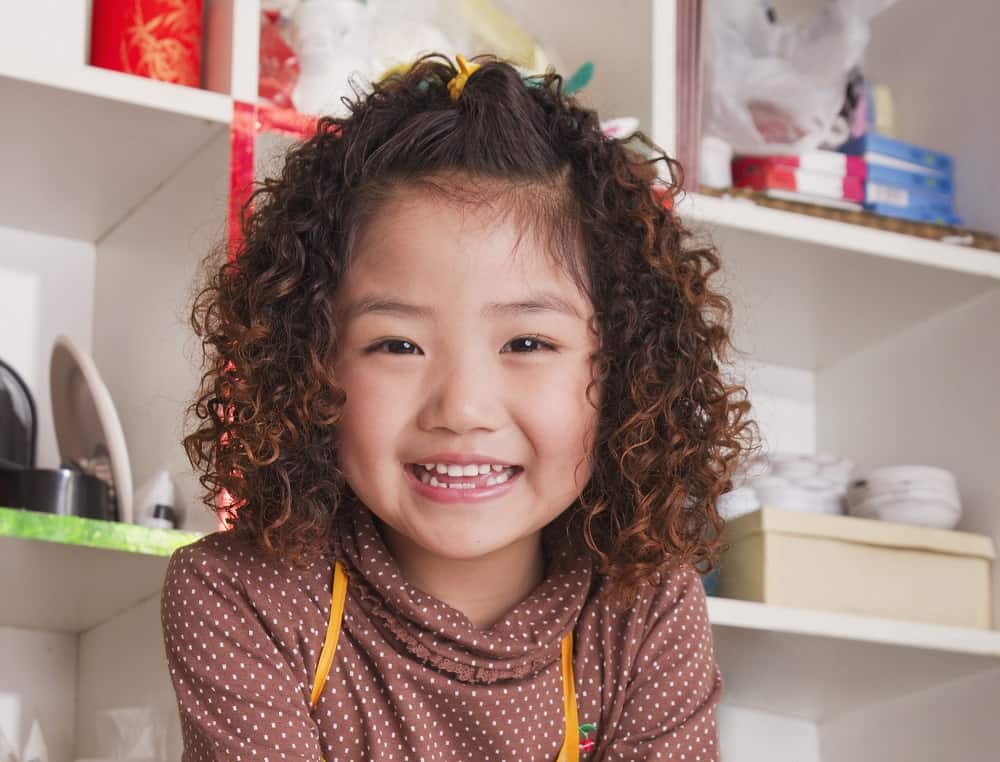 Asian little girl with short curls