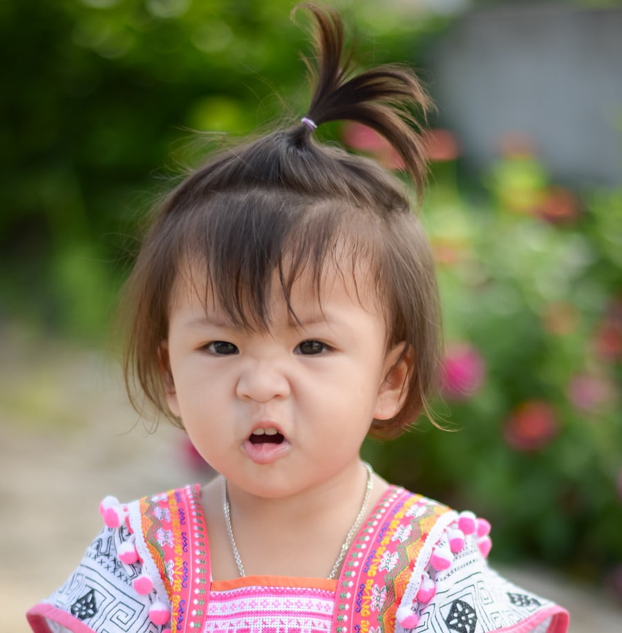 Asian little girl's short hair