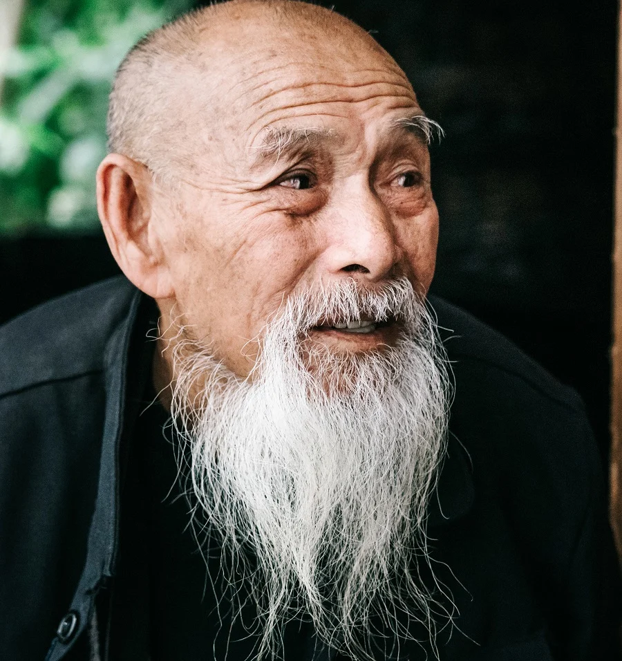 Asian older guy with very long goatee beard