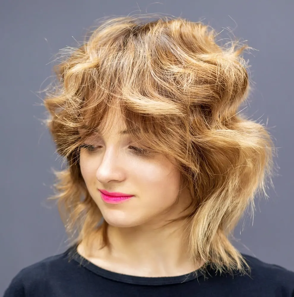 Best Haircuts for a Triangle Shaped Face - Feathered Bangs