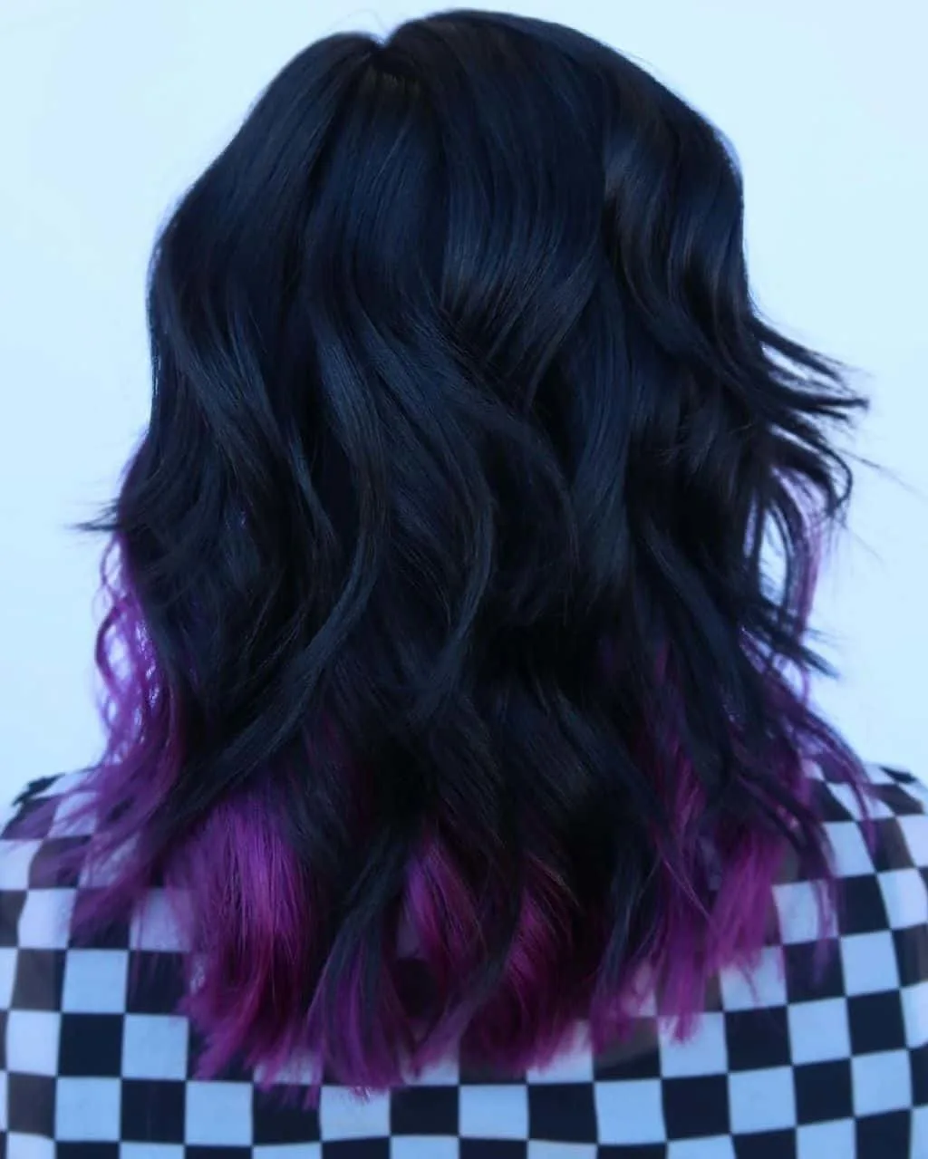 Black Hairstyle with Purple Underneath