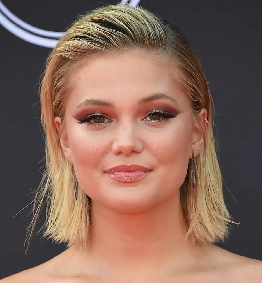 Blonde Actress Olivia Holt With Brown Eyes